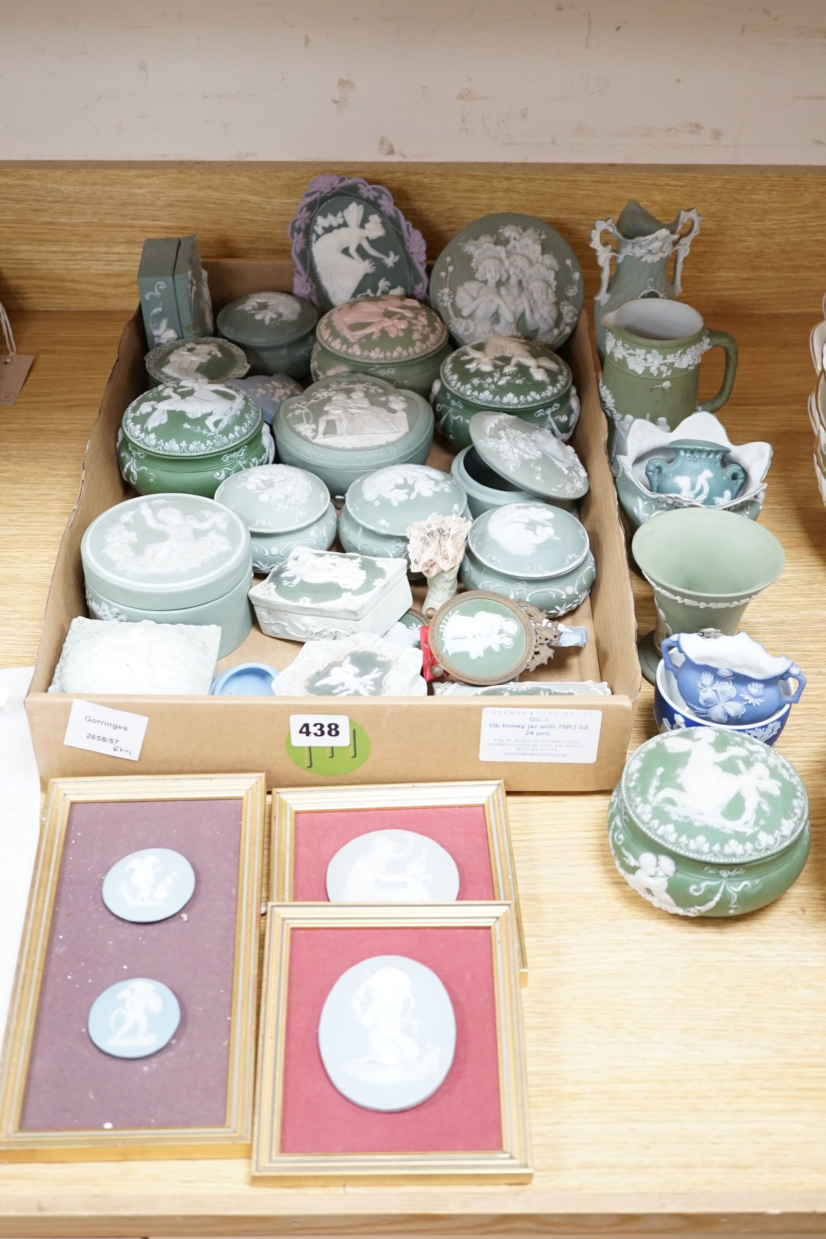 A collection of French bisque boxes and vases